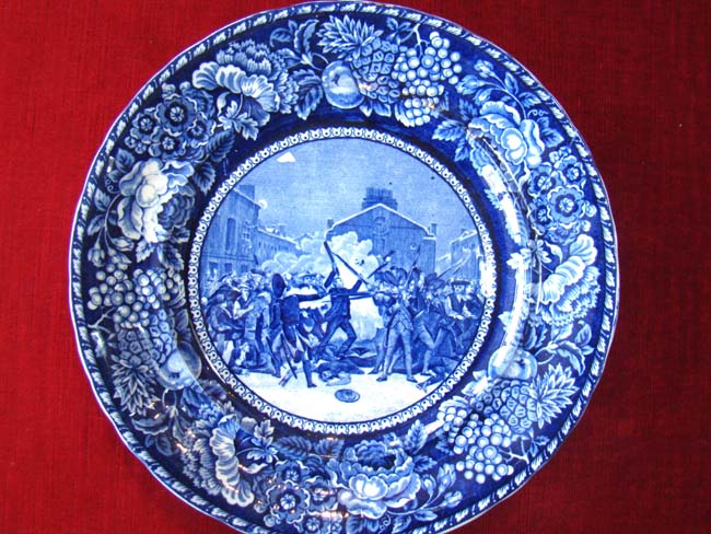 An historic and rare Staffordshire plate circa 1905 depicting "The Boston Massacre & The Old State House, March 5, 1770"